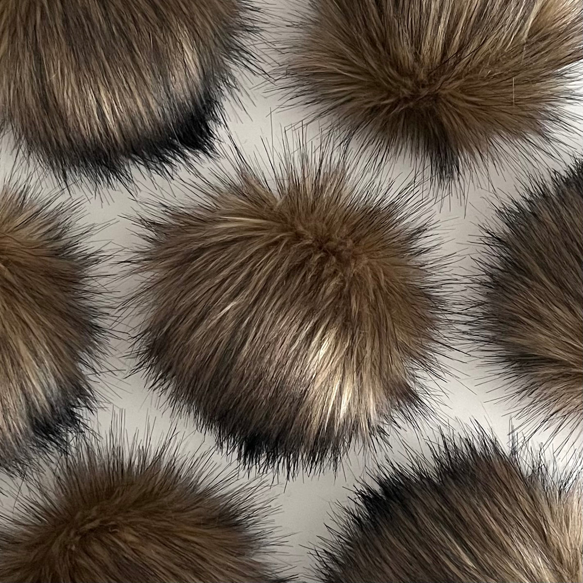 COCOA luxury faux fur pom pom
